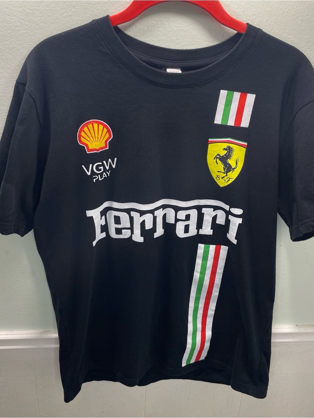 Ferrari Black Tee with Small Yellow Shield Detail